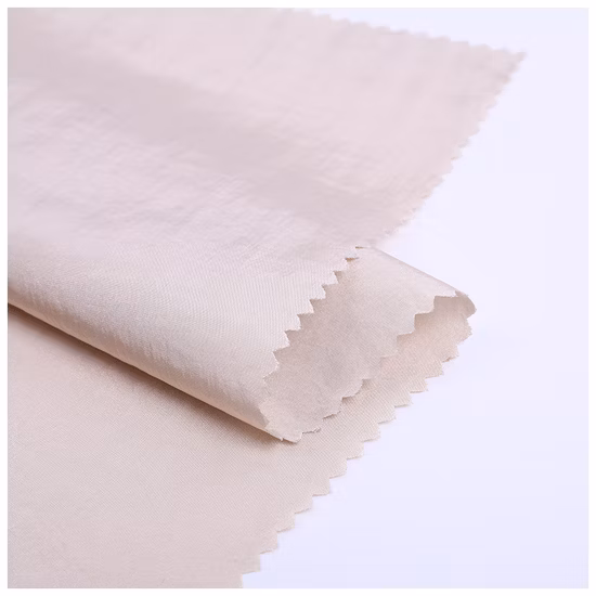 Hotsale 100% Nylon 380t tafetán arrugado /arrugas con acabado de lámina dorado bronceado para tela/prendas/chaquetas de plumas